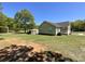 Traditional home with a well-maintained lawn, carport and a cozy front porch offering a welcoming curb appeal at 4285 Palmer Lloyd Rd, Lancaster, SC 29720
