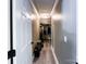 Walk-in closet with shelving, clothing, luggage, and gray plank flooring at 4285 Palmer Lloyd Rd, Lancaster, SC 29720
