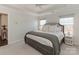 Spacious primary bedroom featuring natural light, tray ceilings, and a relaxing atmosphere at 4303 Patriots Hill Rd, Mint Hill, NC 28227