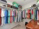 Walk-in closet with shelving and hanging rods for optimal storage at 4303 Patriots Hill Rd, Mint Hill, NC 28227