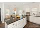 Bright kitchen with a center island, stainless steel appliances, and an open layout for easy entertaining at 4303 Patriots Hill Rd, Mint Hill, NC 28227