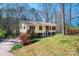 Charming single-Gathering home with a well-manicured front lawn and mature landscaping at 5451 Gunpowder Dr, Hickory, NC 28601