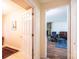 Hallway that leads to a living area with beautiful stone fireplace at 5451 Gunpowder Dr, Hickory, NC 28601