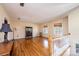 Spacious living room with hardwood floors, large windows, and staircase access at 5451 Gunpowder Dr, Hickory, NC 28601