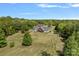 Overhead view of the home, showcasing its idyllic setting amid lush greenery at 5546/5510 Hoodtown Rd, Sharon, SC 29742