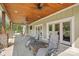 Relaxing covered patio with outdoor seating, ceiling fans, and an inviting outdoor space at 5546/5510 Hoodtown Rd, Sharon, SC 29742