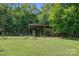 Open-air outbuilding, perfect for storage and utility, surrounded by a lush green lawn at 5546/5510 Hoodtown Rd, Sharon, SC 29742