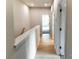 Hallway with LVP flooring leading into bright rooms with windows and natural light at 615 Billingsley Rd, Charlotte, NC 28211