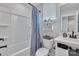 Bright bathroom features a shower-tub combo, modern vanity, and stylish fixtures at 648 W End Dr, Charlotte, NC 28208