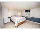 Bedroom features paneled walls, a ceiling light and a bed at 726 Grandview Ne Dr, Concord, NC 28025