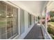 Inviting covered front porch with patterned flooring and views of the landscaped yard at 726 Grandview Ne Dr, Concord, NC 28025