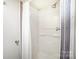 Shower features a white shower curtain and plastic shelving unit at 726 Grandview Ne Dr, Concord, NC 28025