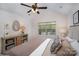The bedroom features a ceiling fan and carpeted floors at 7445 Abigail Glen Dr, Charlotte, NC 28212
