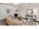 Comfortable living room with modern decor, fireplace, and plenty of seating at 7445 Abigail Glen Dr, Charlotte, NC 28212