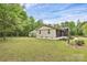 Charming home with a well-maintained yard, mature trees, and a peaceful setting at 8301 Washington Blvd, Charlotte, NC 28262