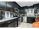 Stylish kitchen features granite countertops, stainless steel appliances, and ample cabinet space at 8301 Washington Blvd, Charlotte, NC 28262