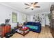 Comfortable living room featuring wood floors, lots of natural light, and a welcoming atmosphere at 8301 Washington Blvd, Charlotte, NC 28262