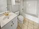 Clean bathroom with white fixtures, tile floors, and practical design for everyday comfort and convenience at 8929 Meadow Vista Rd, Charlotte, NC 28213