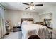 A serene bedroom boasts a comfy bed, tasteful decor, and a mirrored closet at 9052 Meadowmont View Dr, Charlotte, NC 28269