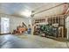 Wide garage interior, primed and ready for your personal touch and storage needs at 9052 Meadowmont View Dr, Charlotte, NC 28269