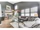 Open-concept living space with kitchen view, modern decor, and ample natural light at 9052 Meadowmont View Dr, Charlotte, NC 28269
