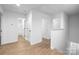 Bright upstairs hallway with modern flooring at 1034 Dooley Dr, Charlotte, NC 28227
