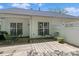 Wide backyard has fenced yard, wooden deck, and outdoor seating and dining area at 11841 Mourning Dove Ln, Charlotte, NC 28269