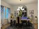 Elegant dining room showcasing a beautifully set table, stylish lighting, and sophisticated decor at 123 Grey Fox Ln, Mount Gilead, NC 27306