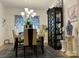 Charming dining area with stylish accents, a modern chandelier, and ample natural light at 123 Grey Fox Ln, Mount Gilead, NC 27306