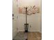 Hallway featuring a coat rack, neutral decor, and hardwood floors at 123 Grey Fox Ln, Mount Gilead, NC 27306