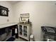 Charming laundry room featuring custom cabinet and shelf decor, with stylish accents at 123 Grey Fox Ln, Mount Gilead, NC 27306