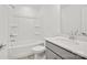 Bright bathroom features a shower-tub combo with a white shower stall, sink with chrome faucet, and modern vanity at 13737 Roderick Dr # 186, Huntersville, NC 28078
