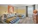 Stylish bedroom featuring two beds, designer touches, and soft natural light at 13752 Roderick Dr # 175, Huntersville, NC 28078