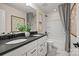 Contemporary bathroom with dual sink vanity, modern fixtures, and shower with soaking tub at 15019 Meadows Hunt Ln # 163, Huntersville, NC 28078