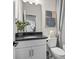 Stylish bathroom with a dark countertop, white cabinets, modern fixtures, and a shower/tub combination at 15019 Meadows Hunt Ln # 163, Huntersville, NC 28078