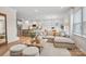 Spacious open-concept living area seamlessly connects the kitchen, dining, and living spaces at 15019 Meadows Hunt Ln # 163, Huntersville, NC 28078