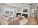 Inviting living room features a fireplace, modern decor, and a comfortable seating area at 15019 Meadows Hunt Ln # 163, Huntersville, NC 28078
