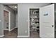 Well-organized pantry with shelving, providing ample storage space for food and kitchen essentials at 15035 Ockeechobee Ct, Mint Hill, NC 28227