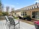 Spacious back deck with ample seating, covered patio, and sliding glass doors at 1669 Beleek Ridge Ln, Clover, SC 29710
