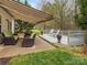 Inviting back deck featuring comfortable seating and a retractable awning, perfect for outdoor relaxation at 1669 Beleek Ridge Ln, Clover, SC 29710