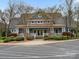 Exterior of a clubhouse featuring a covered porch and stone accents at 1669 Beleek Ridge Ln, Clover, SC 29710