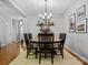 Spacious dining area with chandelier and seating for six at 1669 Beleek Ridge Ln, Clover, SC 29710