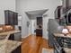 Open kitchen with stainless steel appliances, breakfast area, and hardwood floors at 1669 Beleek Ridge Ln, Clover, SC 29710