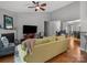 Open-concept living space featuring hardwood floors, high ceilings, and abundant natural light at 1669 Beleek Ridge Ln, Clover, SC 29710