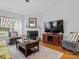 Cozy living area featuring a fireplace, television, and stylish decor at 1669 Beleek Ridge Ln, Clover, SC 29710