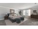 Spacious main bedroom with carpet, neutral walls, and a window letting in natural light at 18013 Aura Mist Way # 183, Huntersville, NC 28078