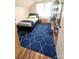 Efficient bedroom with hardwood floors, geometric rug, and natural light at 206 23Rd Nw St, Hickory, NC 28601