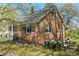 Charming two-story brick home with well-maintained landscaping and inviting front porch at 206 23Rd Nw St, Hickory, NC 28601