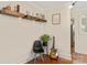 Cozy living area with hardwood floors, floating shelves, and stylish accents at 206 23Rd Nw St, Hickory, NC 28601