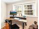 Dedicated home office space with sit/stand desk and natural light from a large window at 206 23Rd Nw St, Hickory, NC 28601